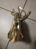 This vintage 90s quilted gold chain shoulder bag