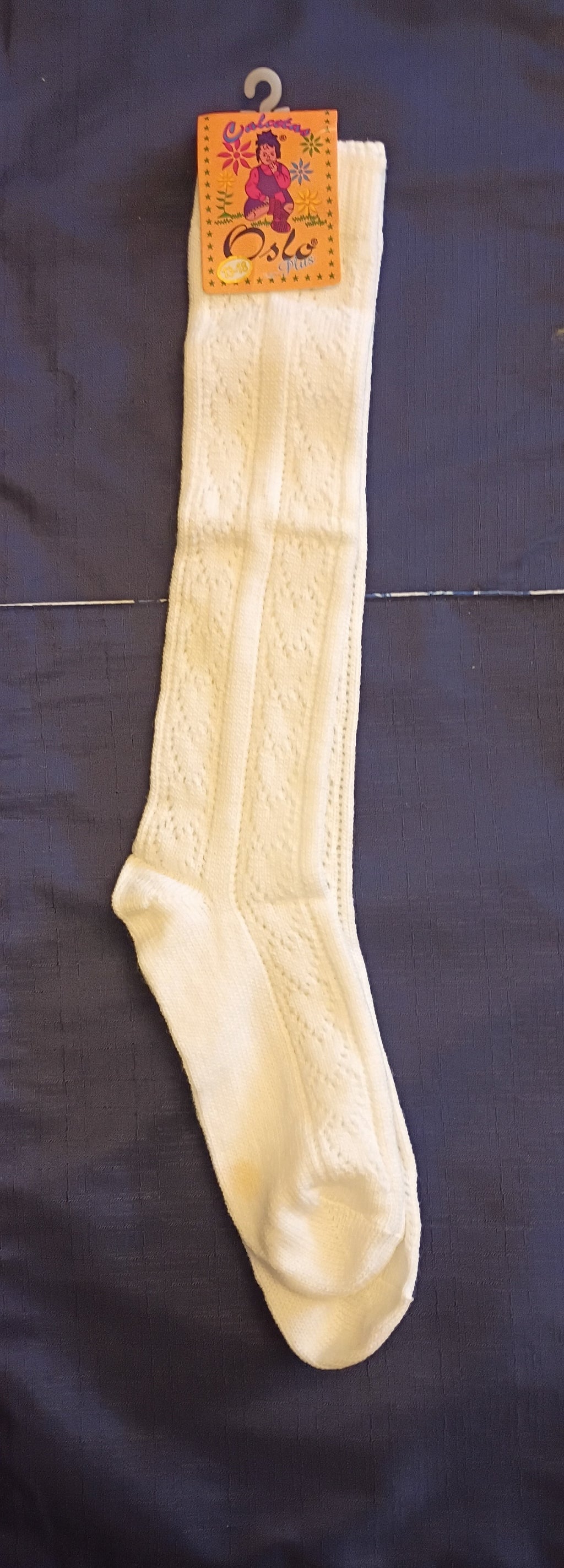✨ Step Into Timeless Comfort: The Classic Pointelle Knee-High SocksWrap